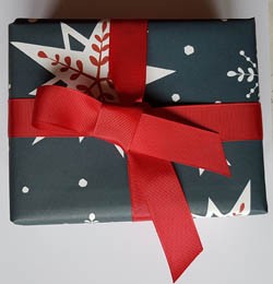 red ribbon  scottish paper wrapped box
